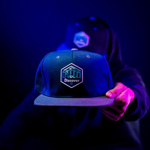 PV+ Discover Patch Applied to a Blue Baseball Cap